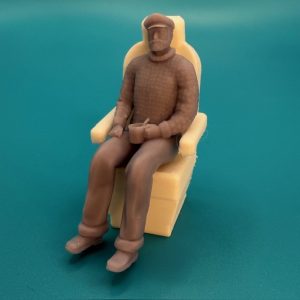 Captains Sitting in his white seat